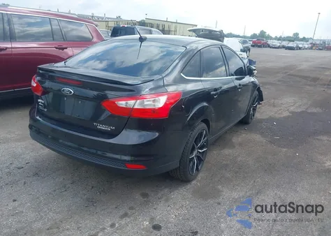 2012 Ford Focus Titanium z USA, uszkodzony, nr VIN 1FAHP3J24CL366021